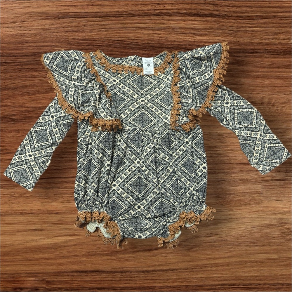 Kate Quinn Geometric Ruffle Bodysuit in Black and Cream